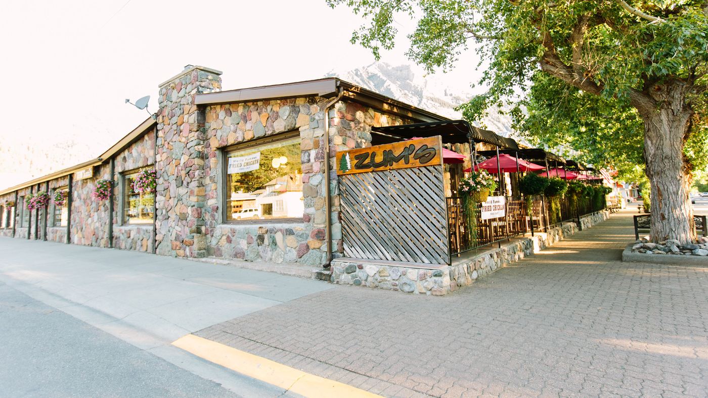 Zum's Eatery and Mercantile stone building on the corner of Waterton Avenue, home of the World Famous Fried Chicken
